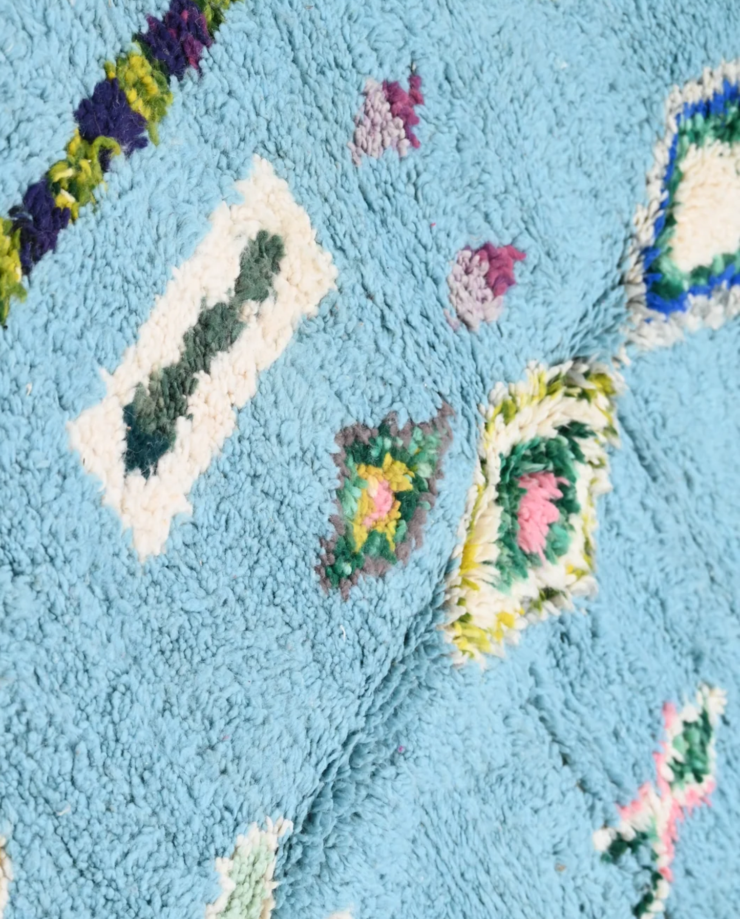 FADDA Azilal sky blue floating forms Moroccan rug close-up showing hand-knotted wool texture and pile detail 2, by NURA