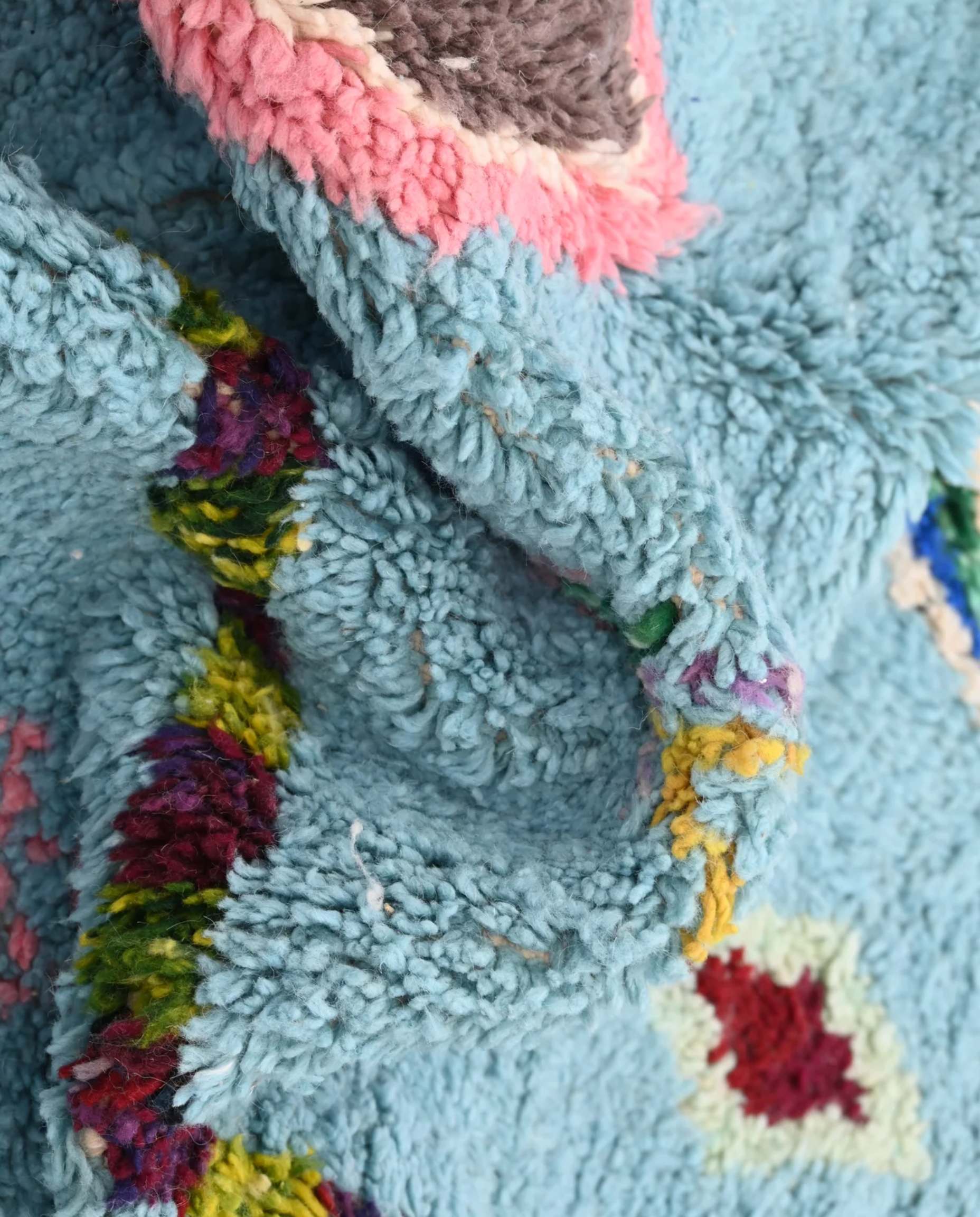 FADDA Azilal sky blue floating forms Moroccan rug close-up showing hand-knotted wool texture and pile detail, by NURA