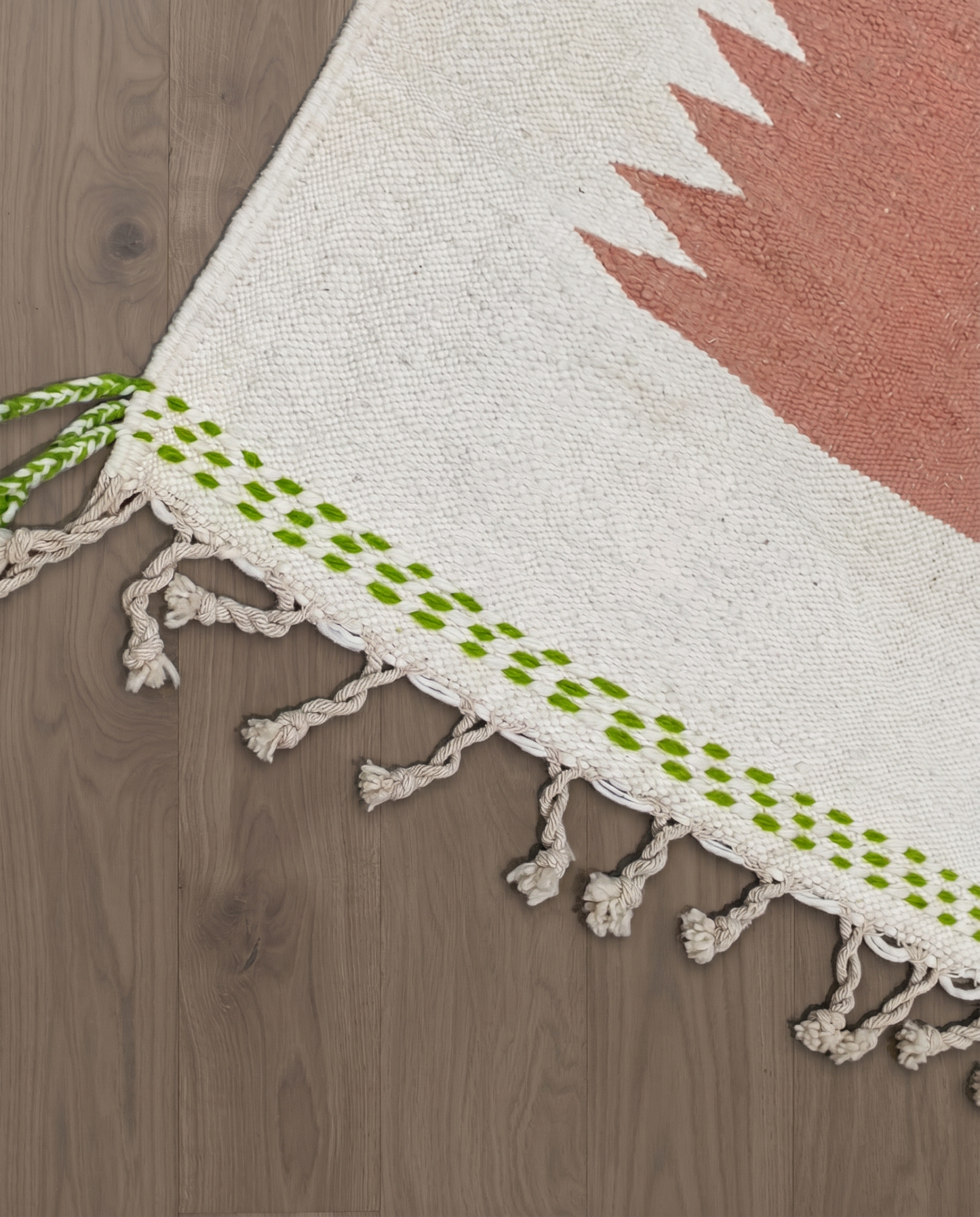 FADILA Azilal cream color block Moroccan rug close-up of hand-tied fringe and kilim band detail, by NURA