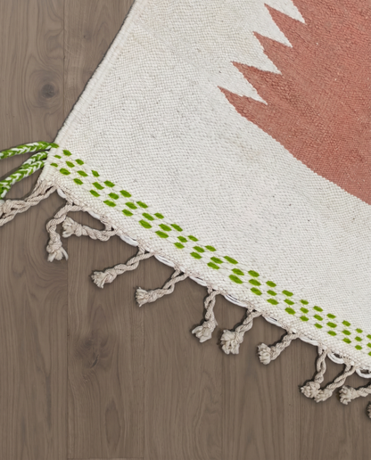 FADILA Azilal cream color block Moroccan rug close-up of hand-tied fringe and kilim band detail, by NURA
