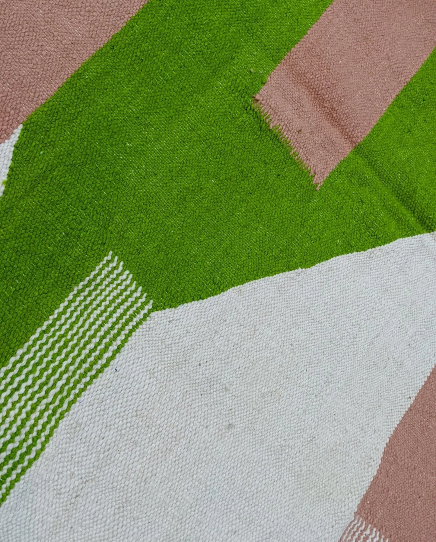 FADILA Azilal cream color block Moroccan rug close-up showing hand-knotted wool texture and pile detail, by NURA