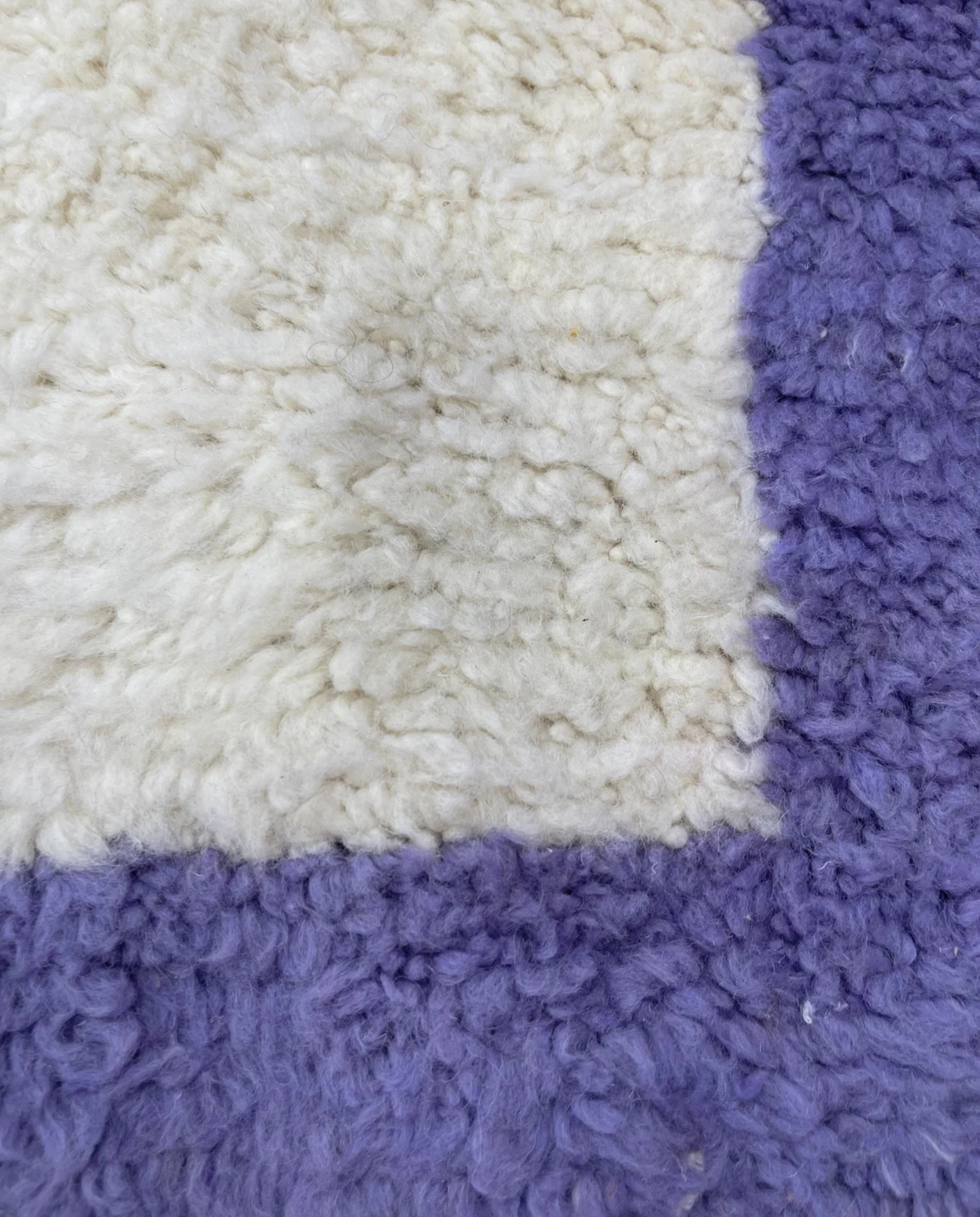 FARAH Beni Ourain ivory solid border Moroccan rug close-up showing hand-knotted wool texture and pile detail 2, by NURA