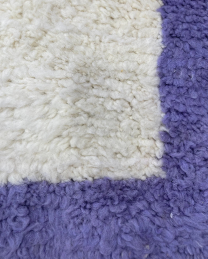 FARAH Beni Ourain ivory solid border Moroccan rug close-up showing hand-knotted wool texture and pile detail 2, by NURA