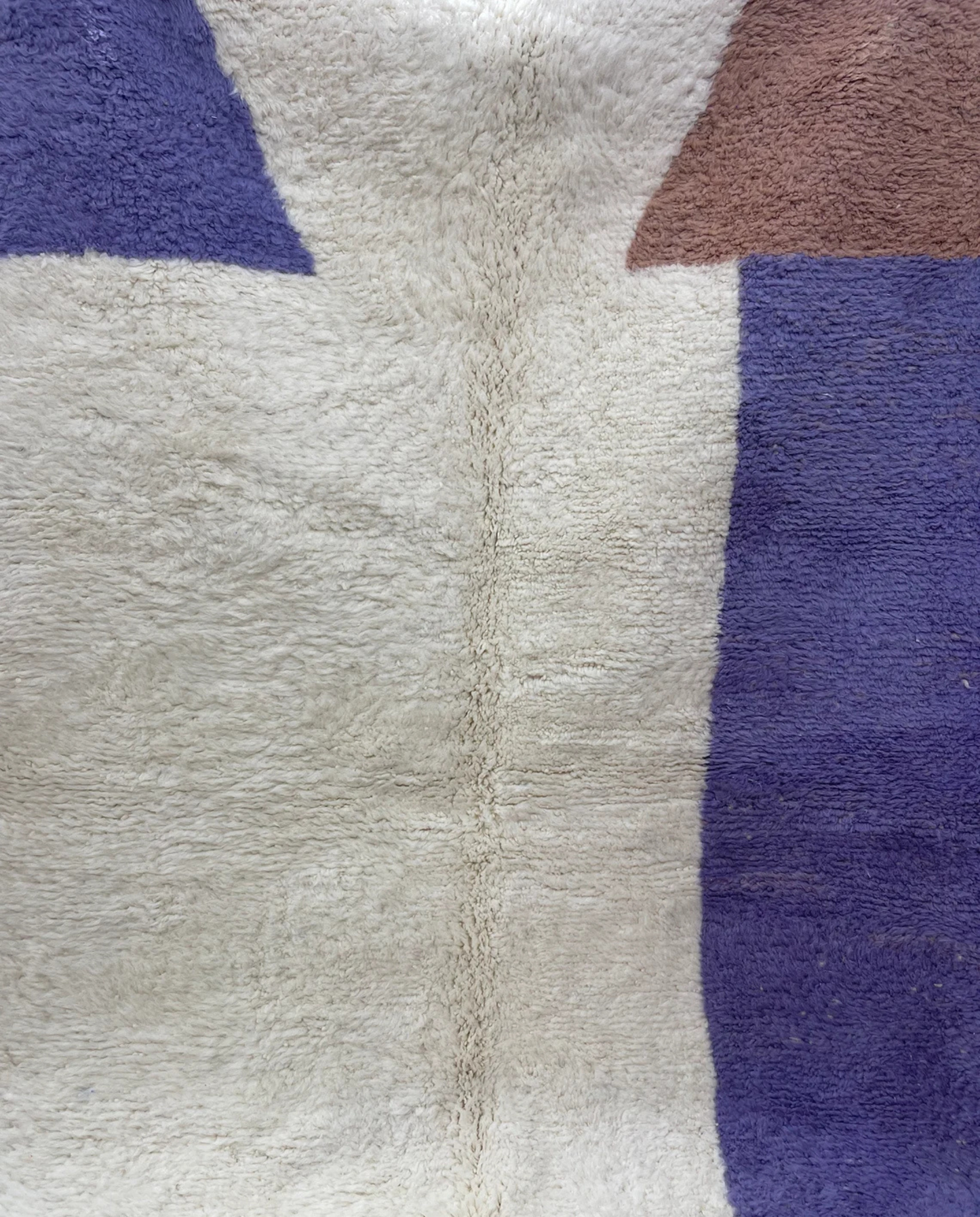 FARAH Beni Ourain ivory solid border Moroccan rug close-up showing hand-knotted wool texture and pile detail, by NURA