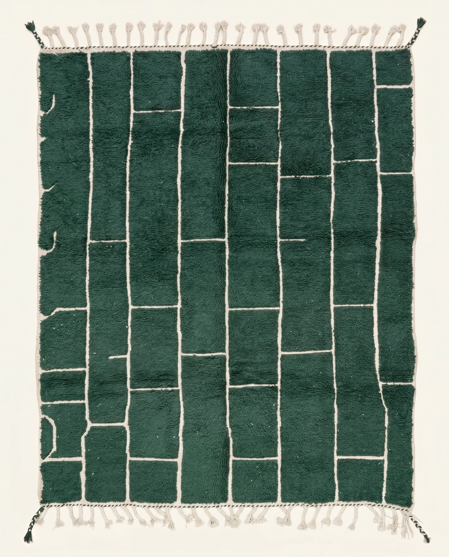 Hand-knotted deep forest green Moroccan rug featuring an irregular cream checker grid pattern in plush wool pile by NURA.