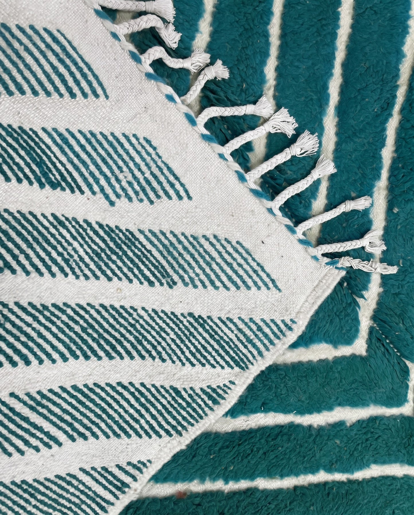 HAFIDA Beni Ourain teal chevron stripes Moroccan rug back view showing traditional handwoven construction, by NURA