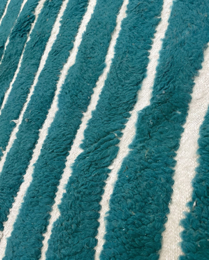 HAFIDA Beni Ourain teal chevron stripes Moroccan rug close-up showing hand-knotted wool texture and pile detail 2, by NURA
