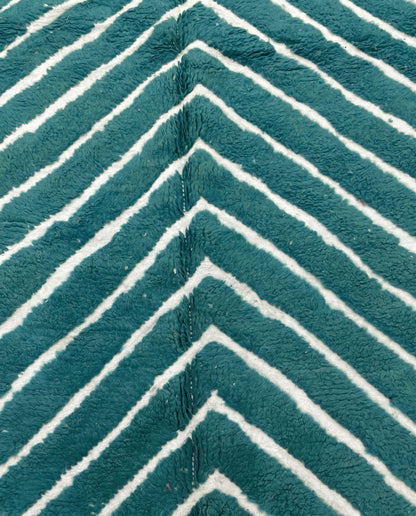 HAFIDA Beni Ourain teal chevron stripes Moroccan rug close-up showing hand-knotted wool texture and pile detail, by NURA