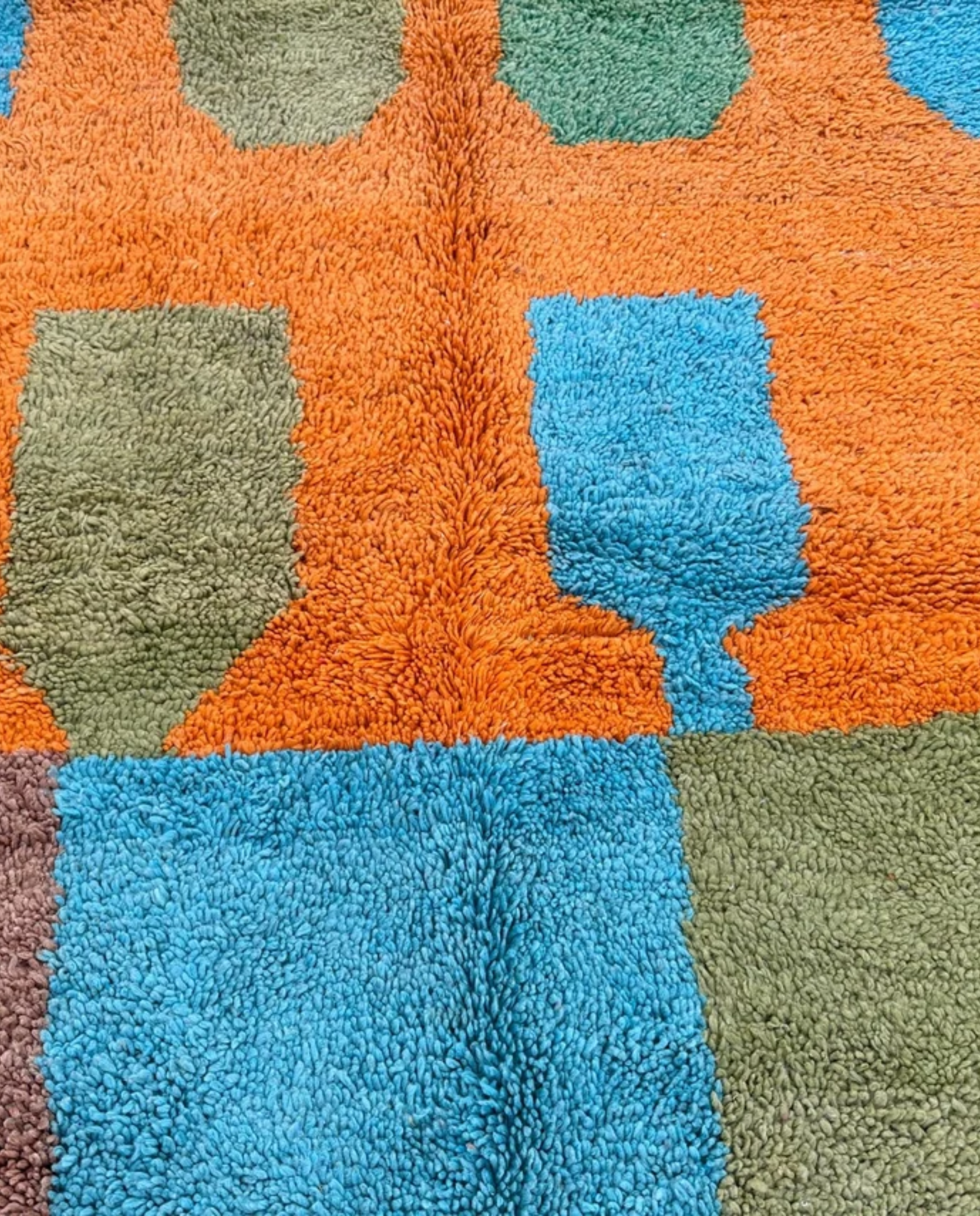 HANAE Beni Ourain orange abstract color block Moroccan rug close-up showing hand-knotted wool texture and pile detail 1, by NURA