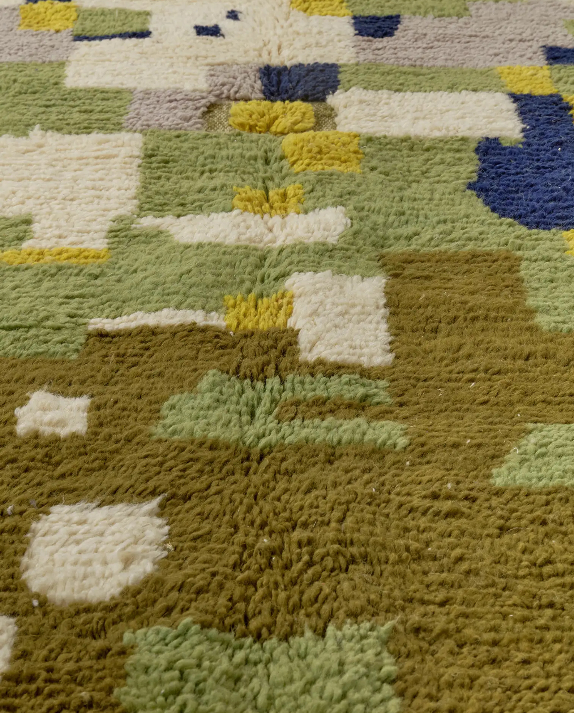 HAYAT Azilal moss green abstract color block Moroccan rug close-up showing hand-knotted wool texture and pile detail 1, by NURA