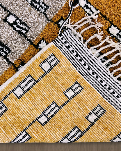 HOUDA Beni Ourain mustard banded geometric field Moroccan rug back view showing traditional handwoven construction, by NURA