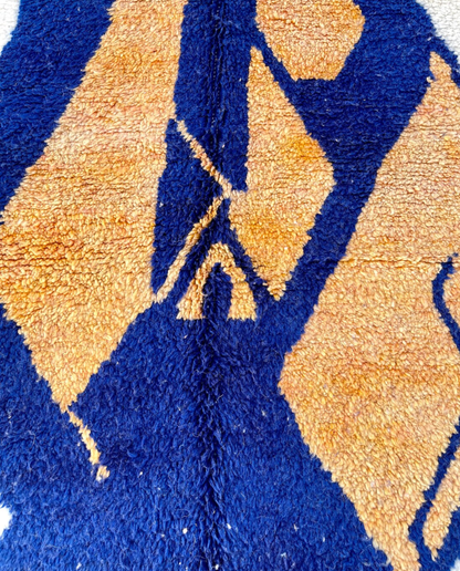 IHSANE Beni Ourain cobalt bold color block Moroccan rug close-up showing hand-knotted wool texture and pile detail, by NURA