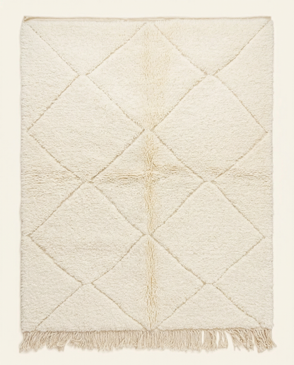 Plush cream Beni Ourain Moroccan rug with a large textured diamond lattice in undyed natural wool high pile, by NURA.