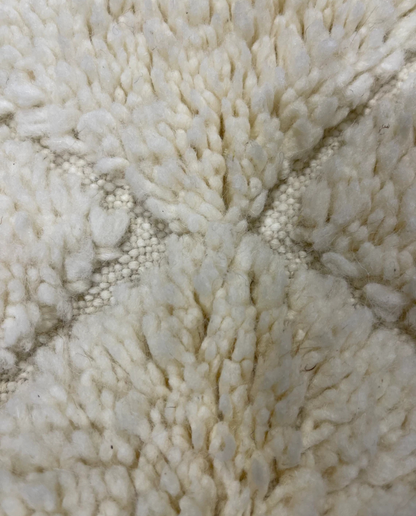 IMANE Beni Ourain cream textured diamond lattice Moroccan rug close-up showing hand-knotted wool texture and pile detail, by NURA