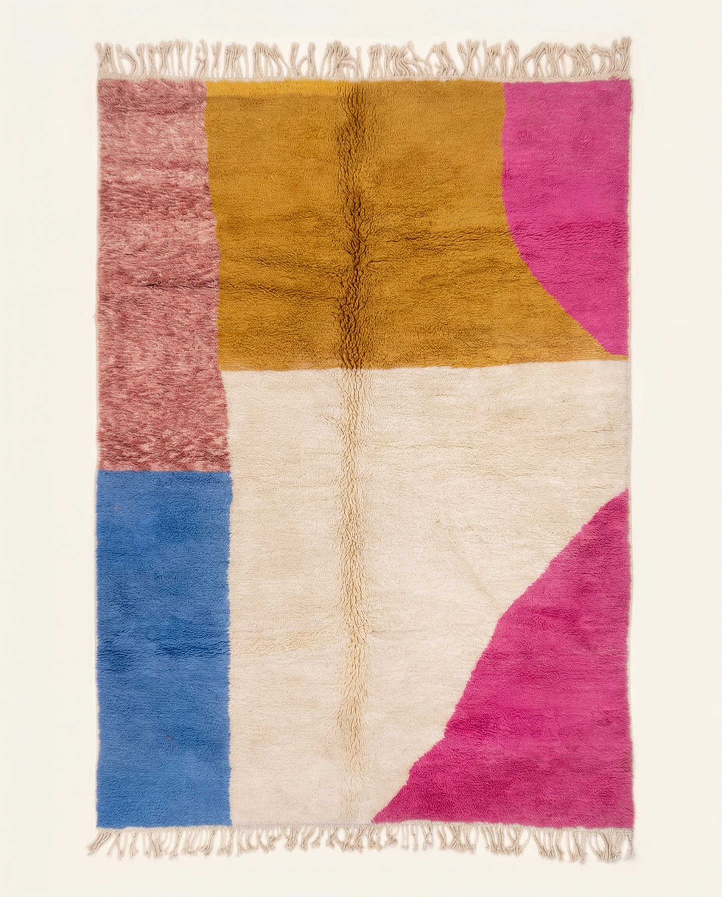 Plush cream Azilal Moroccan rug with bold abstract color blocks in cobalt blue, hot pink, and ochre, by NURA.