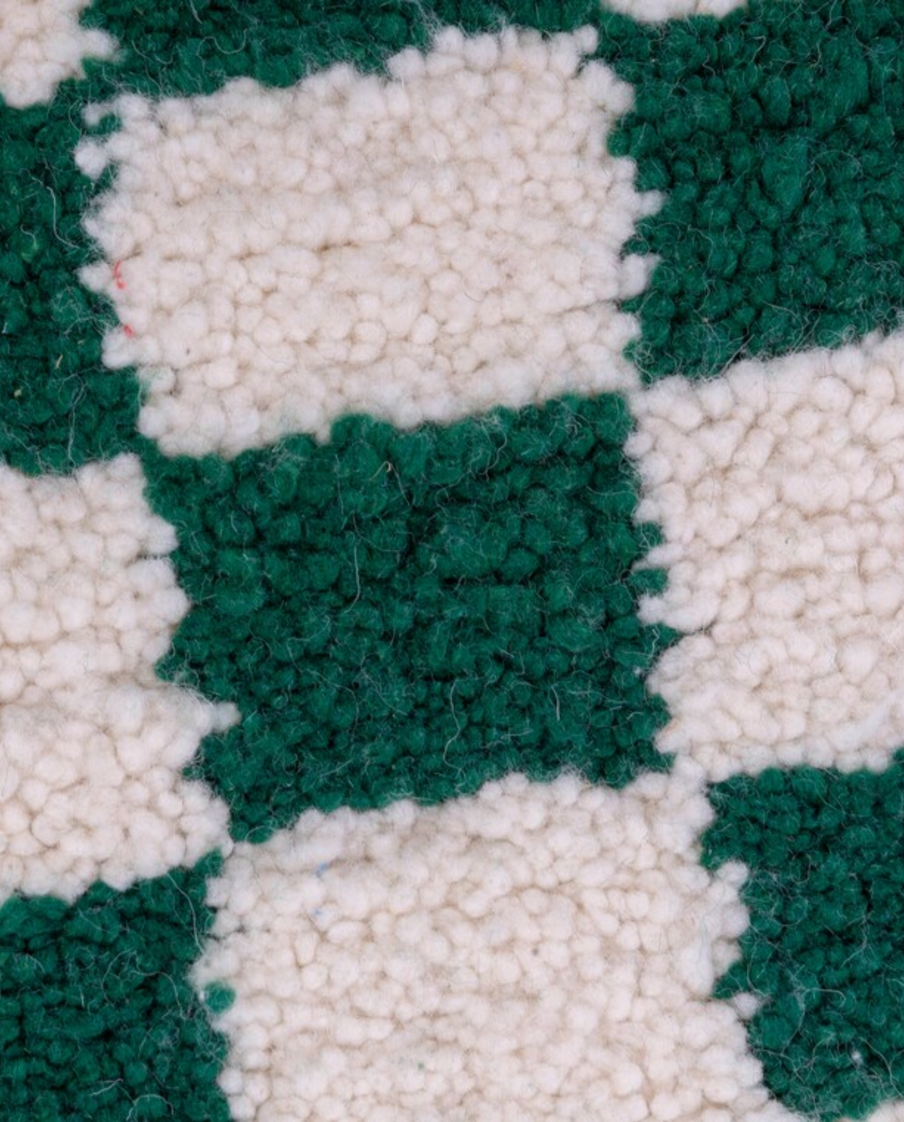 INSAF Beni Ourain green checker grid Moroccan rug close-up showing hand-knotted wool texture and pile detail, by NURA