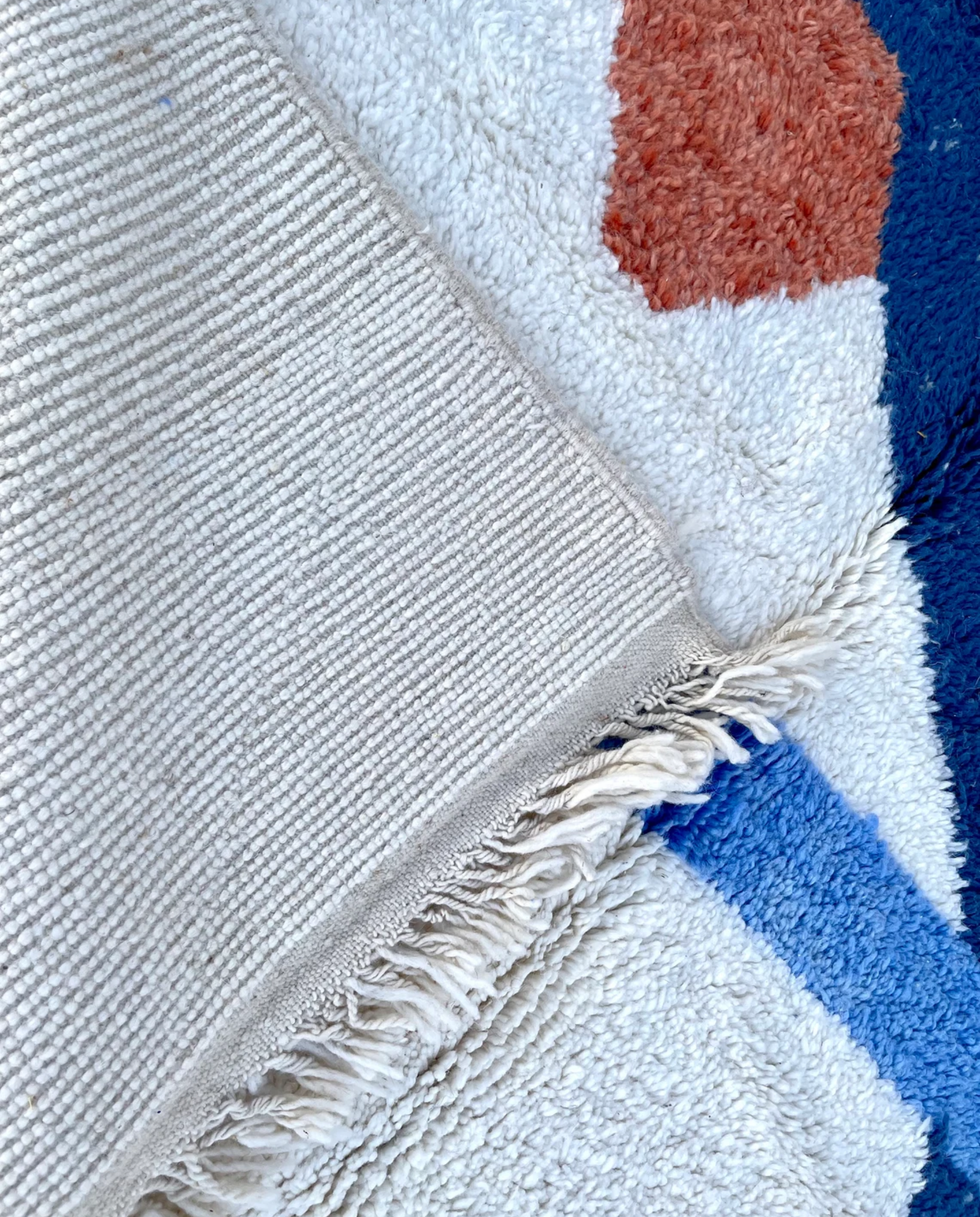 JIHANE Azilal cream abstract color block Moroccan rug back view showing traditional handwoven construction, by NURA