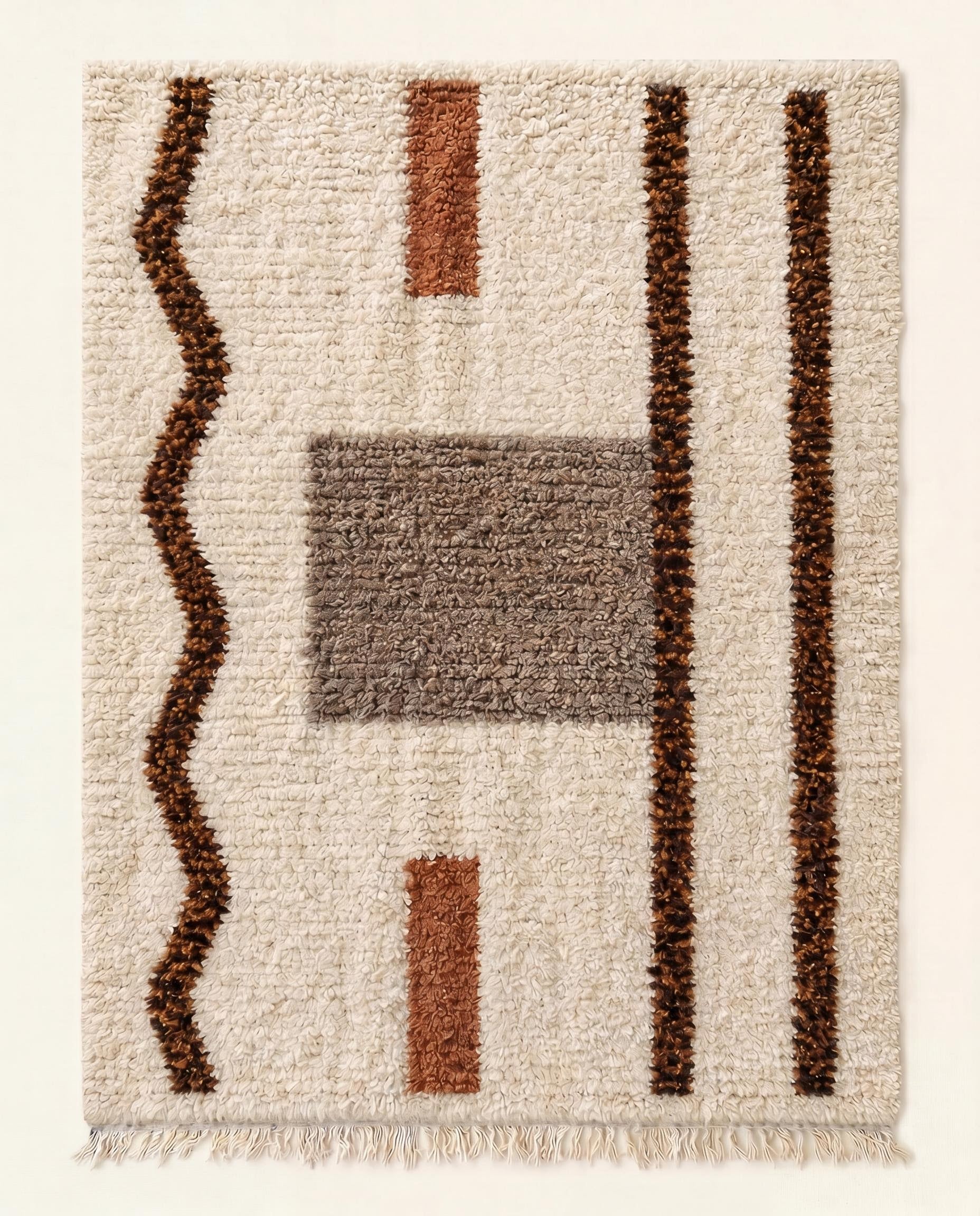 Plush Beni Ourain Moroccan rug with an abstract design of brown lines and grey blocks on a cream wool field by NURA.