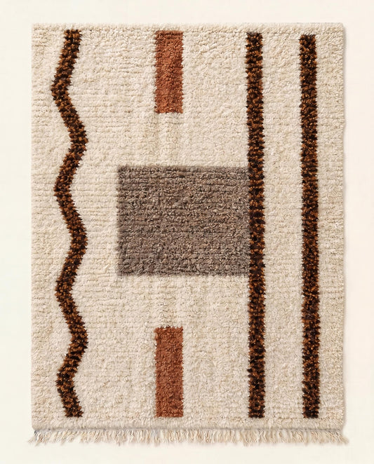 Plush Beni Ourain Moroccan rug with an abstract design of brown lines and grey blocks on a cream wool field by NURA.