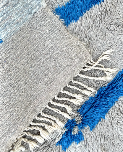 KAOUTAR Beni Ourain grey bold abstract motifs Moroccan rug back view showing traditional handwoven construction, by NURA