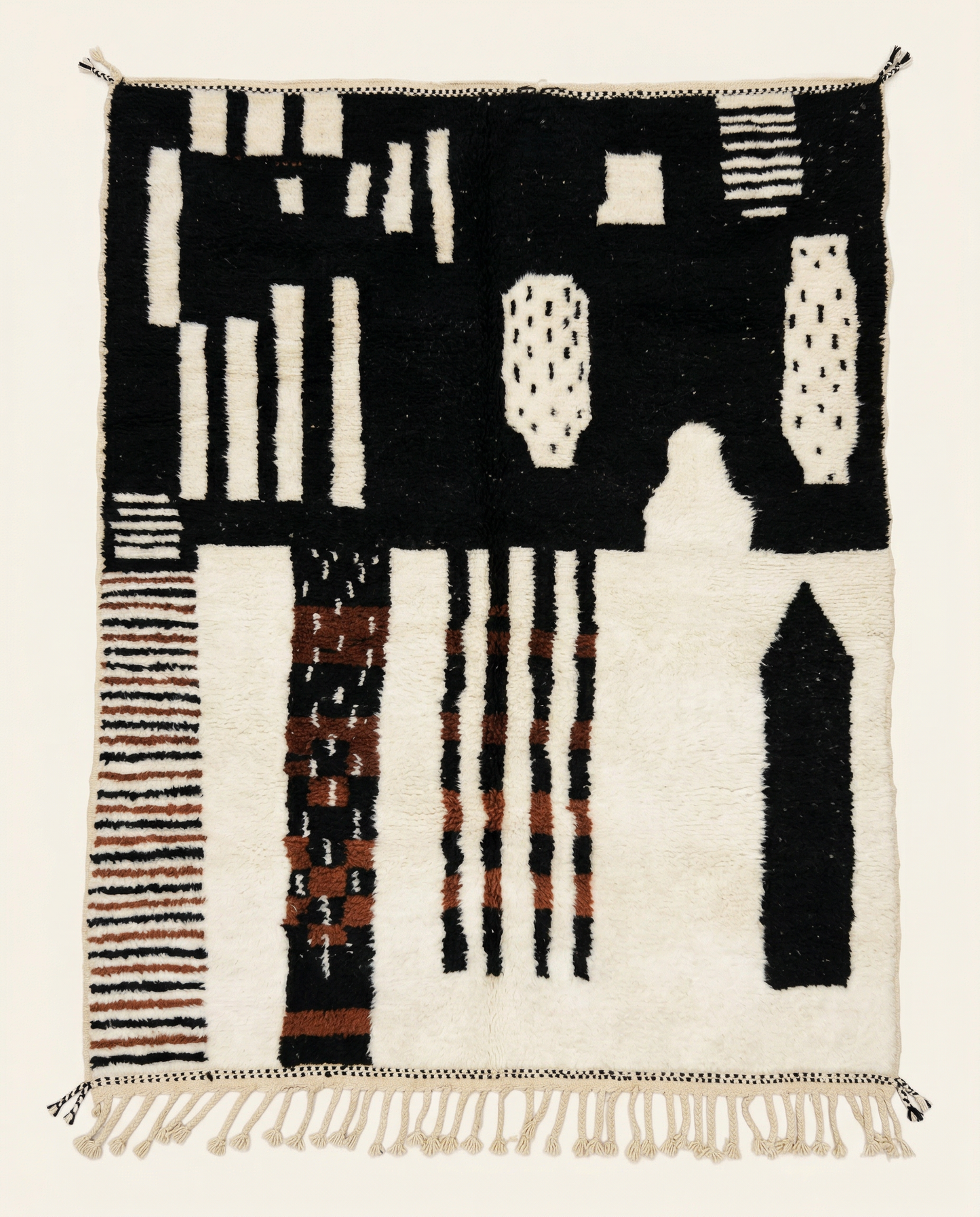 Plush ivory and black Azilal Moroccan rug with bold abstract color blocks and a high pile, by NURA.