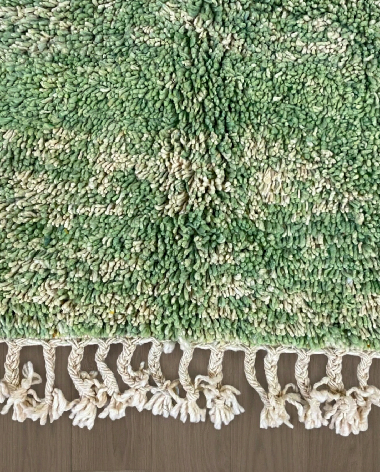KHADIJA Beni Ourain sage abstract color block Moroccan rug close-up of hand-tied fringe and kilim band detail, by NURA