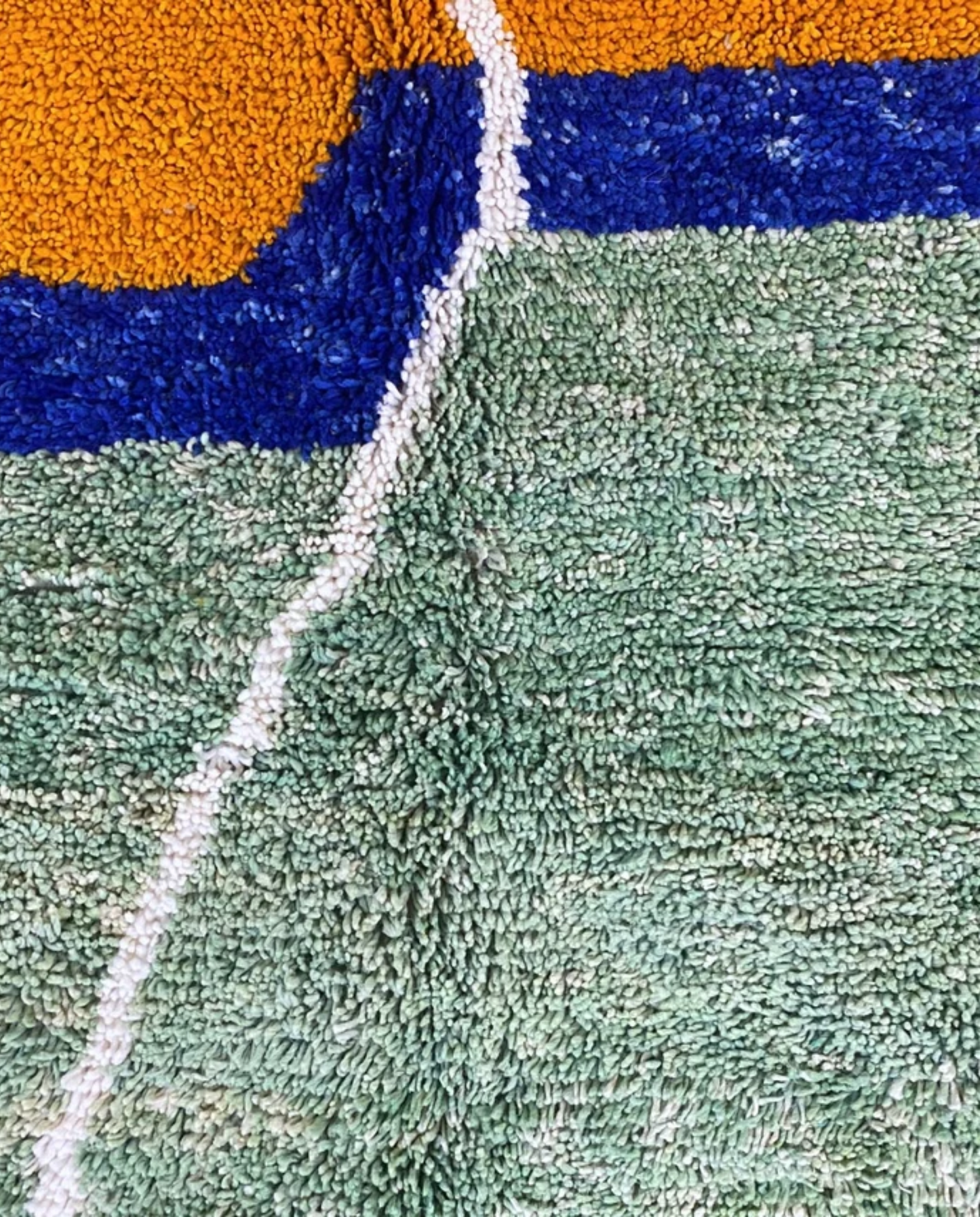 KHADIJA Beni Ourain sage abstract color block Moroccan rug close-up showing hand-knotted wool texture and pile detail 1, by NURA