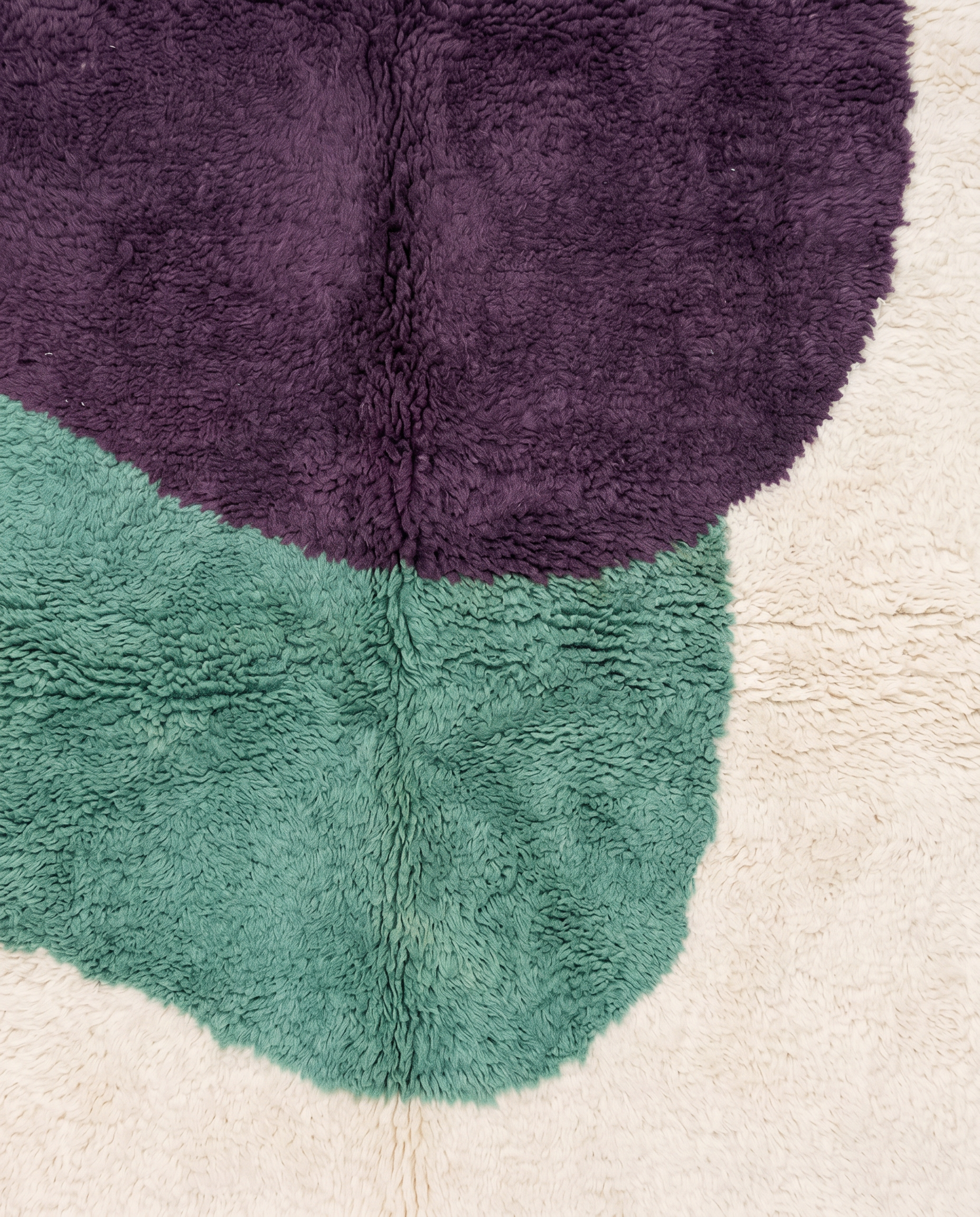 LAMA Azilal cream organic abstract Moroccan rug close-up showing hand-knotted wool texture and pile detail 1, by NURA
