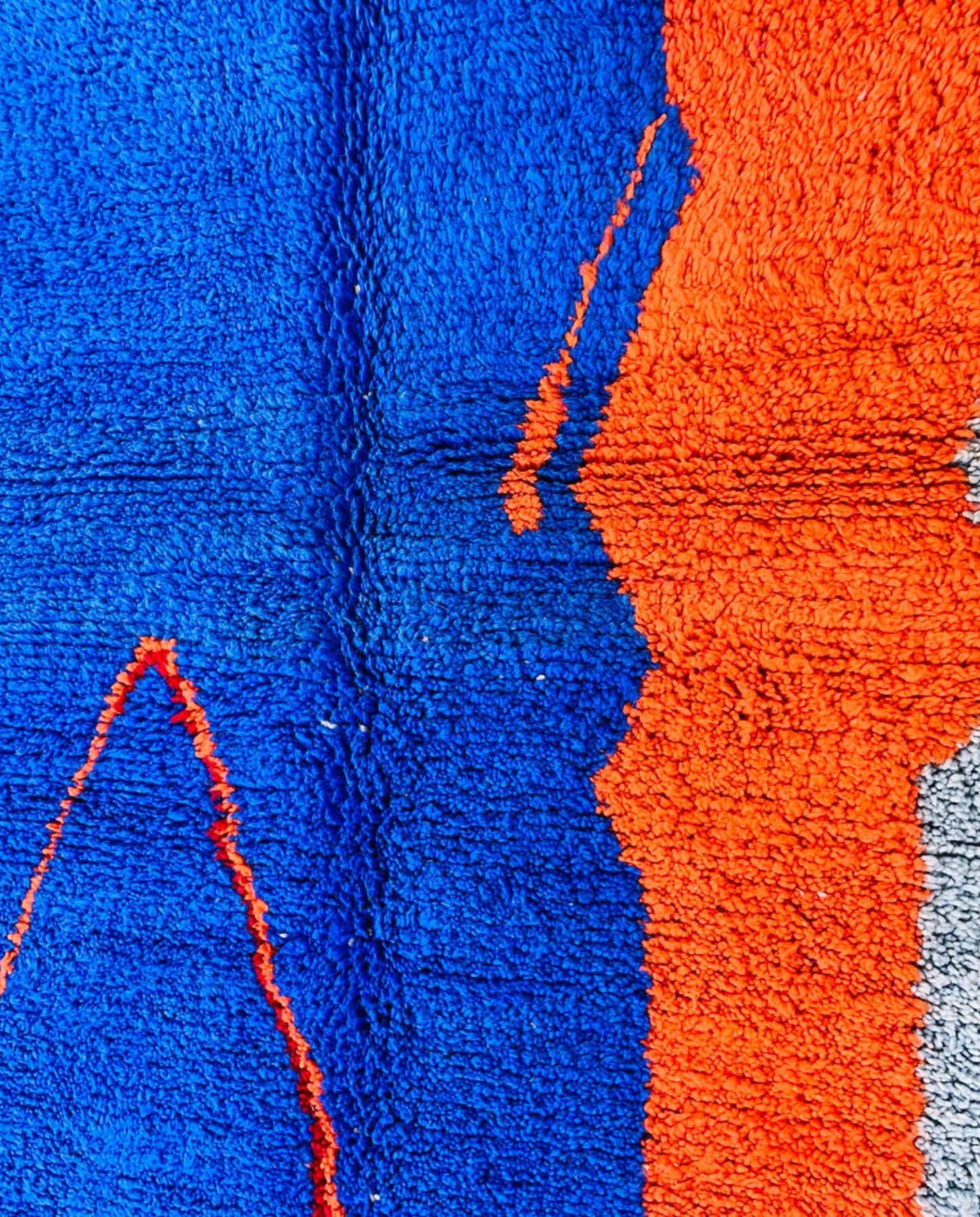 LANA Beni Ourain cobalt abstract color block Moroccan rug close-up showing hand-knotted wool texture and pile detail 2, by NURA