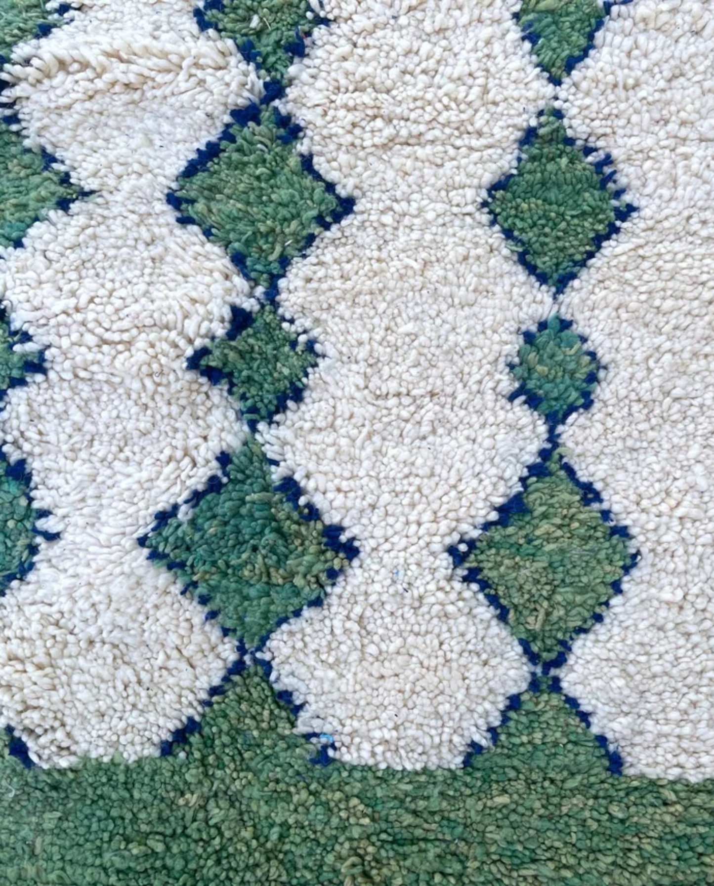 LATIFA Beni Ourain green asymmetrical diamond lattice Moroccan rug close-up showing hand-knotted wool texture and pile detail 2, by NURA