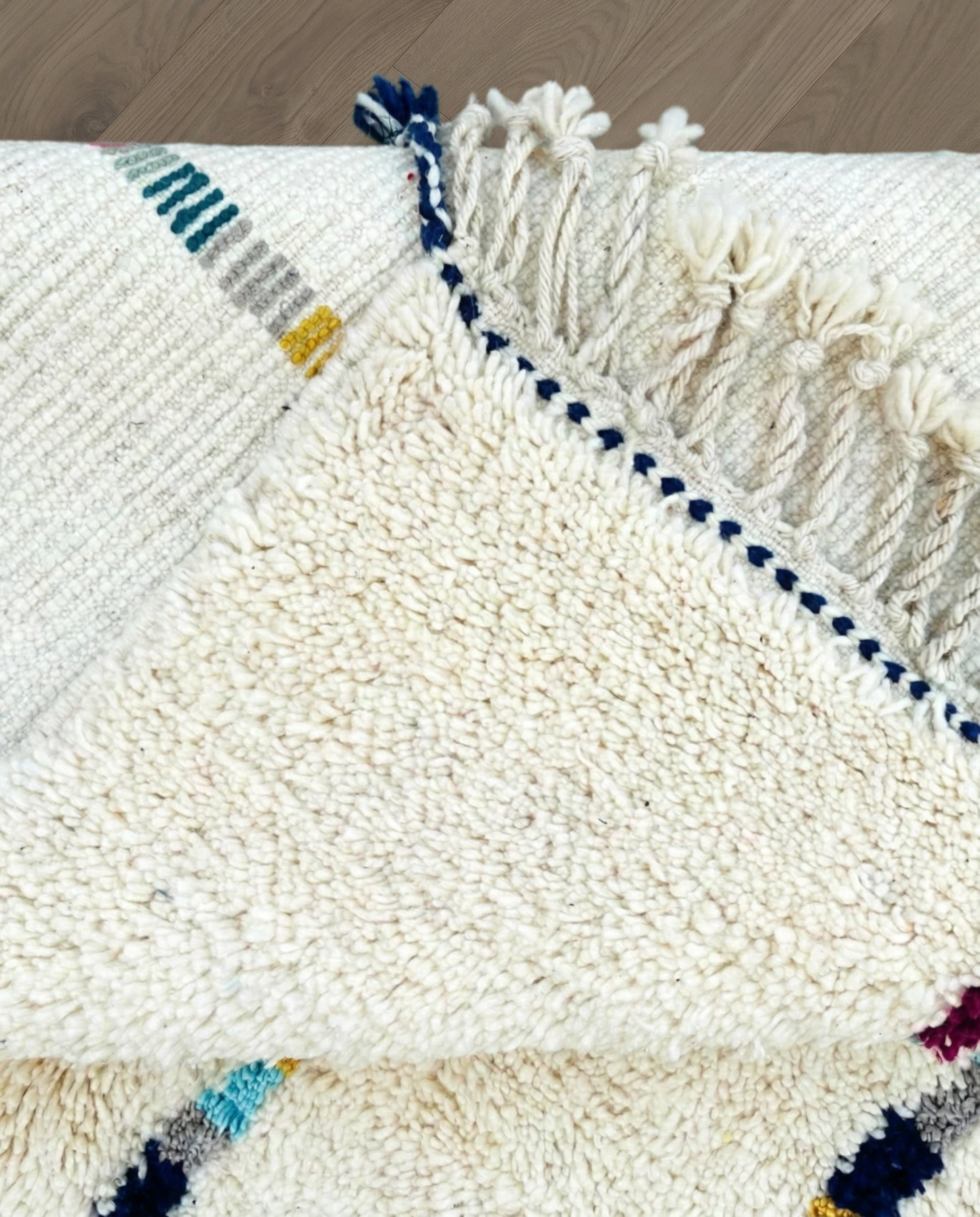 LIANE Azilal cream vertical color block stripes Moroccan rug back view showing traditional handwoven construction, by NURA