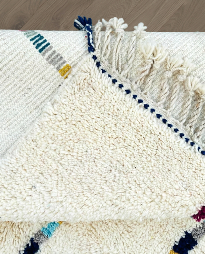 LIANE Azilal cream vertical color block stripes Moroccan rug back view showing traditional handwoven construction, by NURA