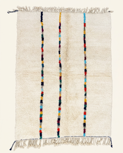 Plush cream Azilal Moroccan rug with three vertical stripes of vibrant multicolor blocks and a high pile, by NURA.