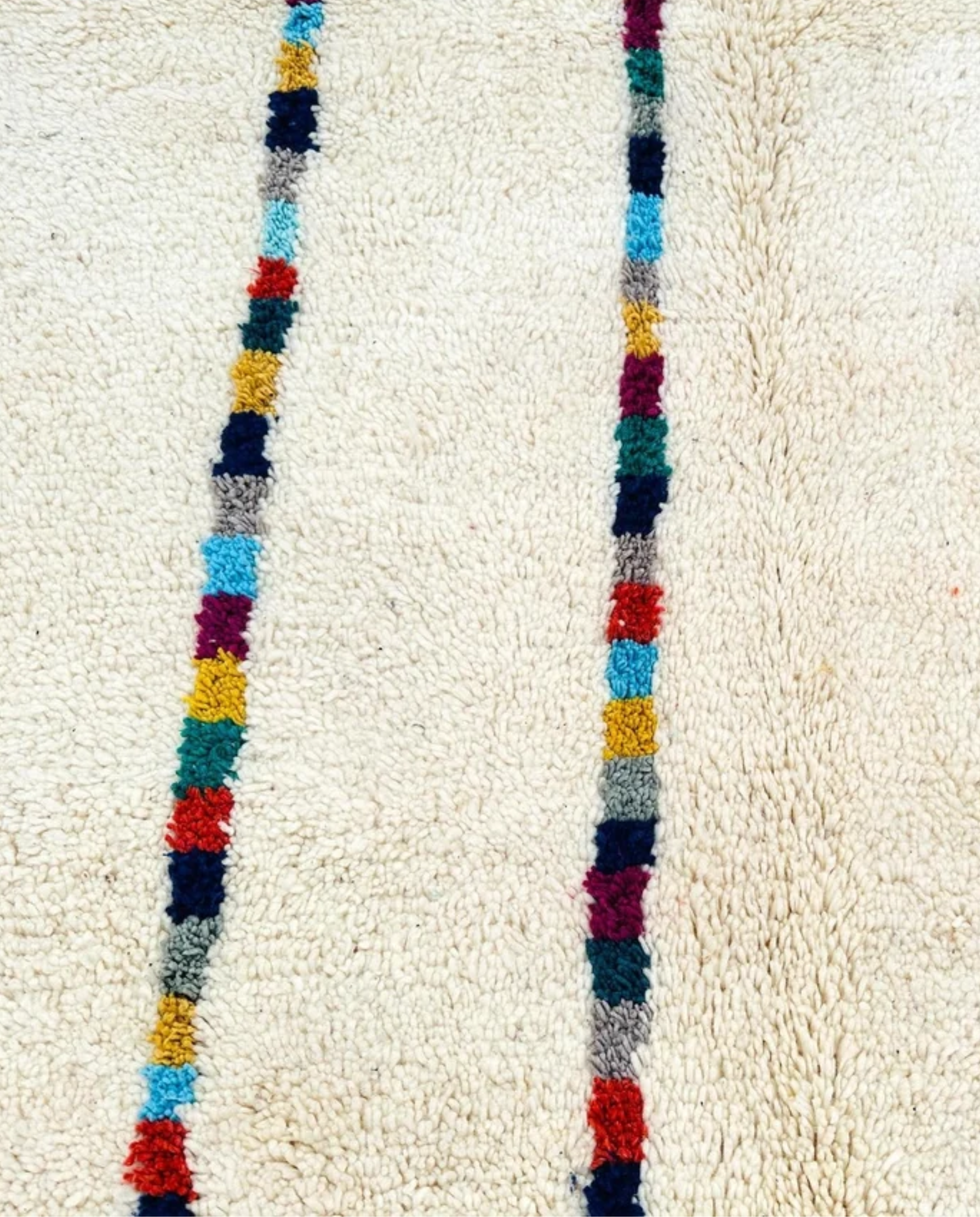 LIANE Azilal cream vertical color block stripes Moroccan rug close-up showing hand-knotted wool texture and pile detail 1, by NURA