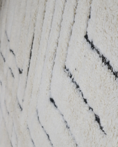LILLA Beni Ourain cream maze motif Moroccan rug close-up showing hand-knotted wool texture and pile detail 1, by NURA