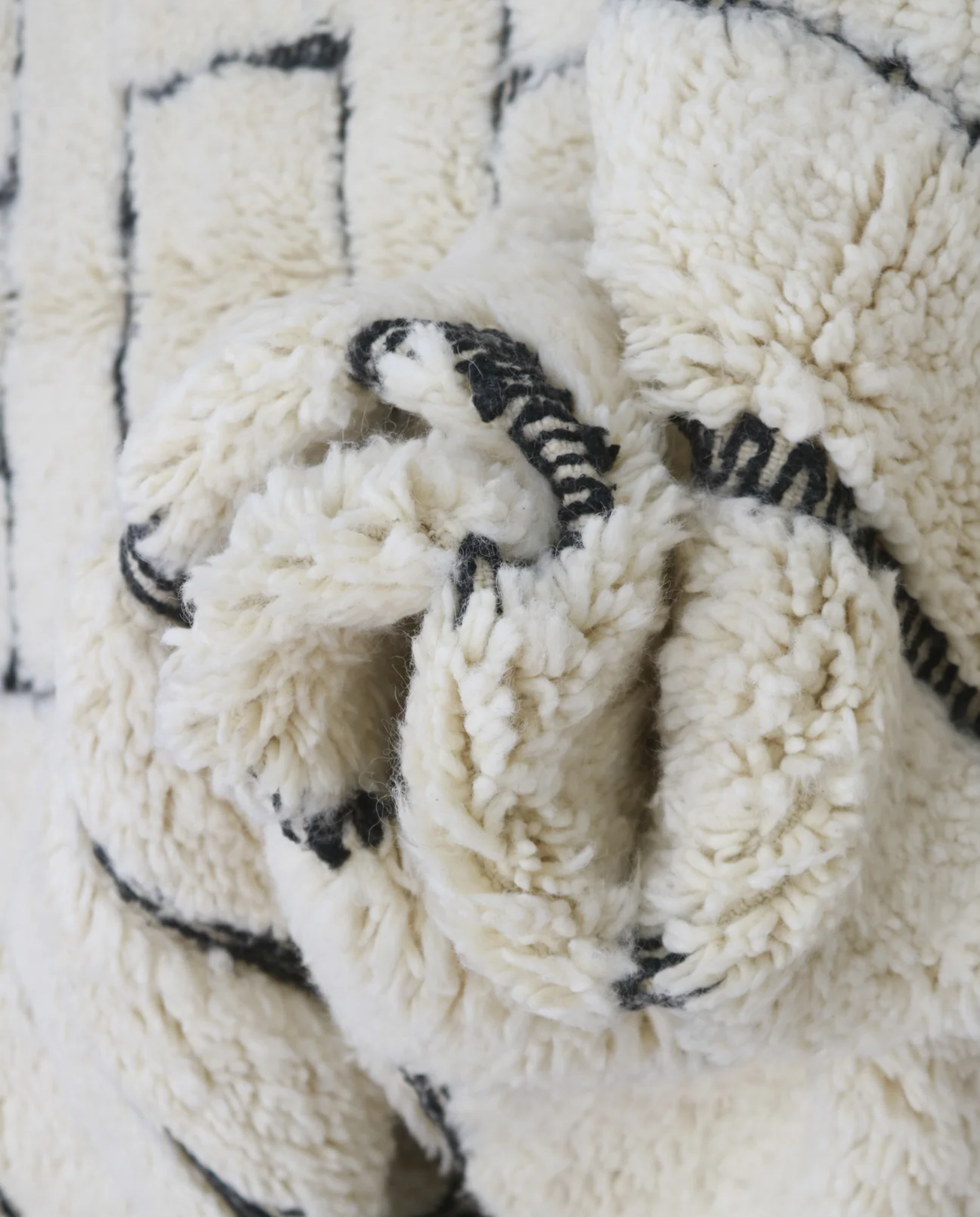 LILLA Beni Ourain cream maze motif Moroccan rug close-up showing hand-knotted wool texture and pile detail 2, by NURA