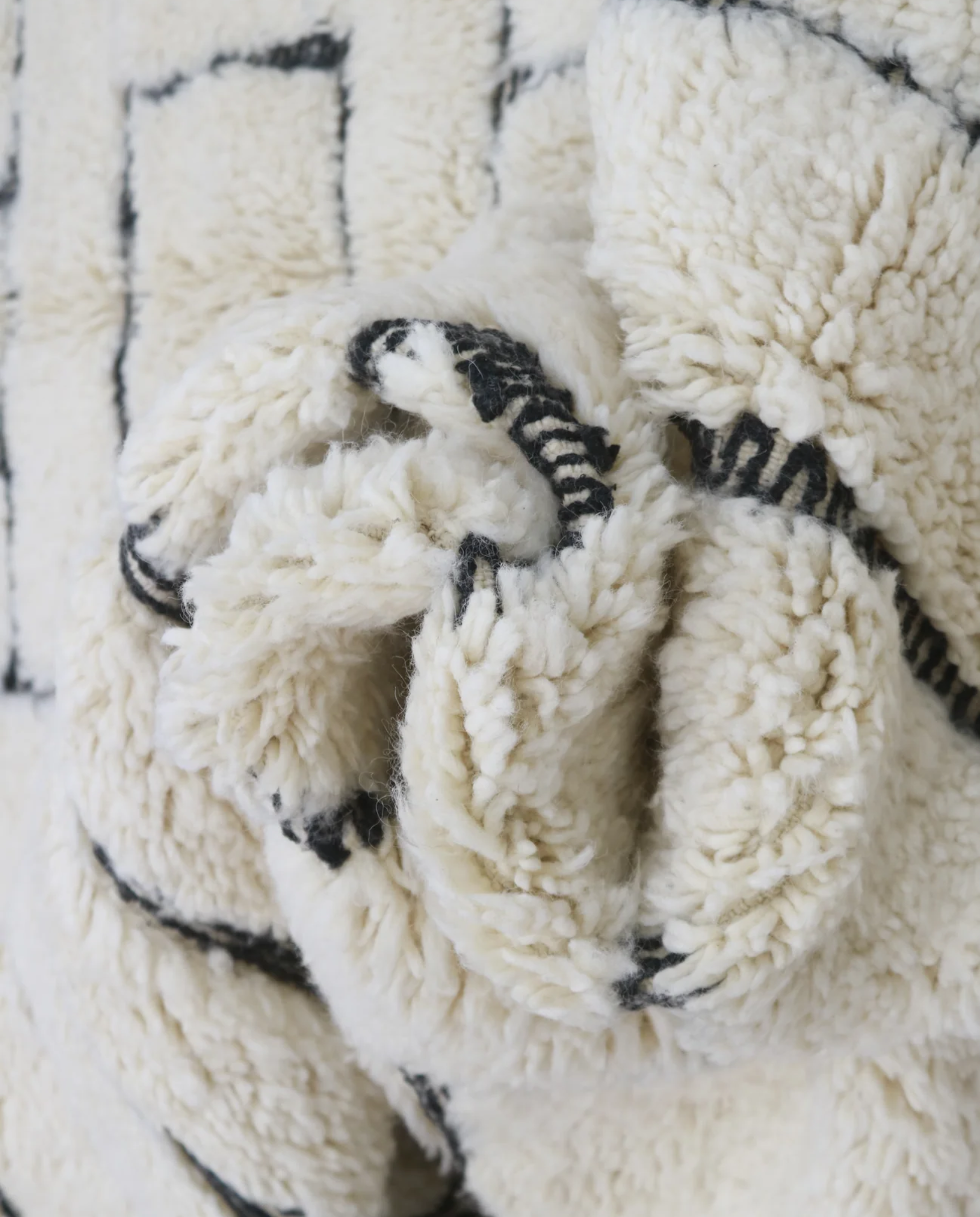 LILLA Beni Ourain cream maze motif Moroccan rug close-up showing hand-knotted wool texture and pile detail 2, by NURA
