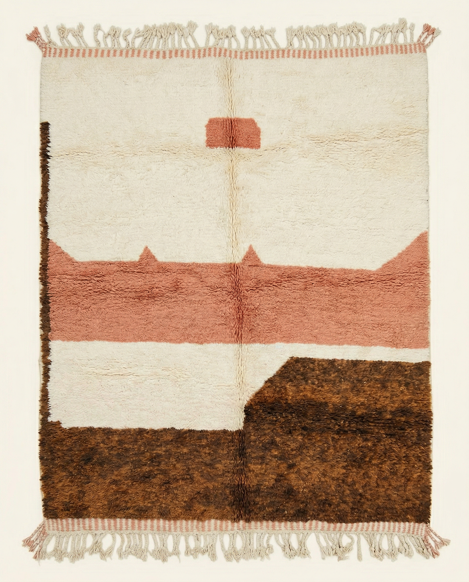 Plush ivory Azilal Moroccan rug with bold abstract color blocks in earthy brown and warm salmon, by NURA.