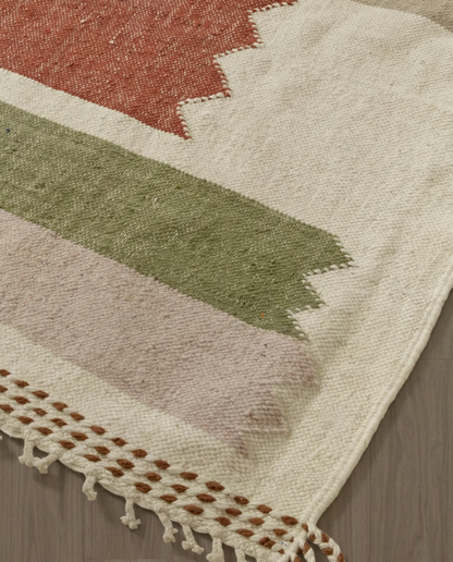 LOUBNA Azilal ivory stepped color blocks Moroccan rug close-up of hand-tied fringe and kilim band detail, by NURA
