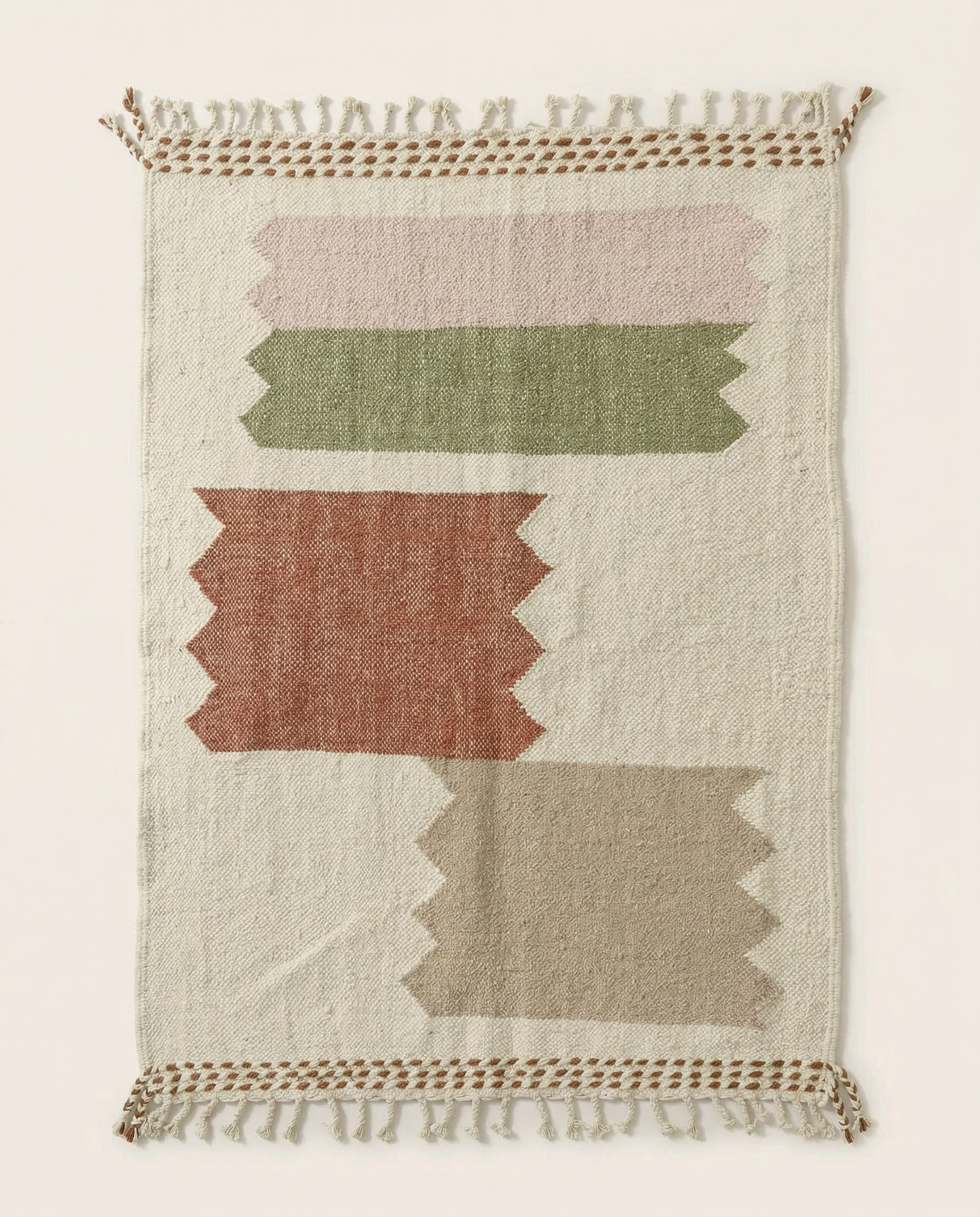 Flat-woven ivory Azilal Moroccan rug with large stepped color blocks in terracotta, sage, and blush, by NURA.