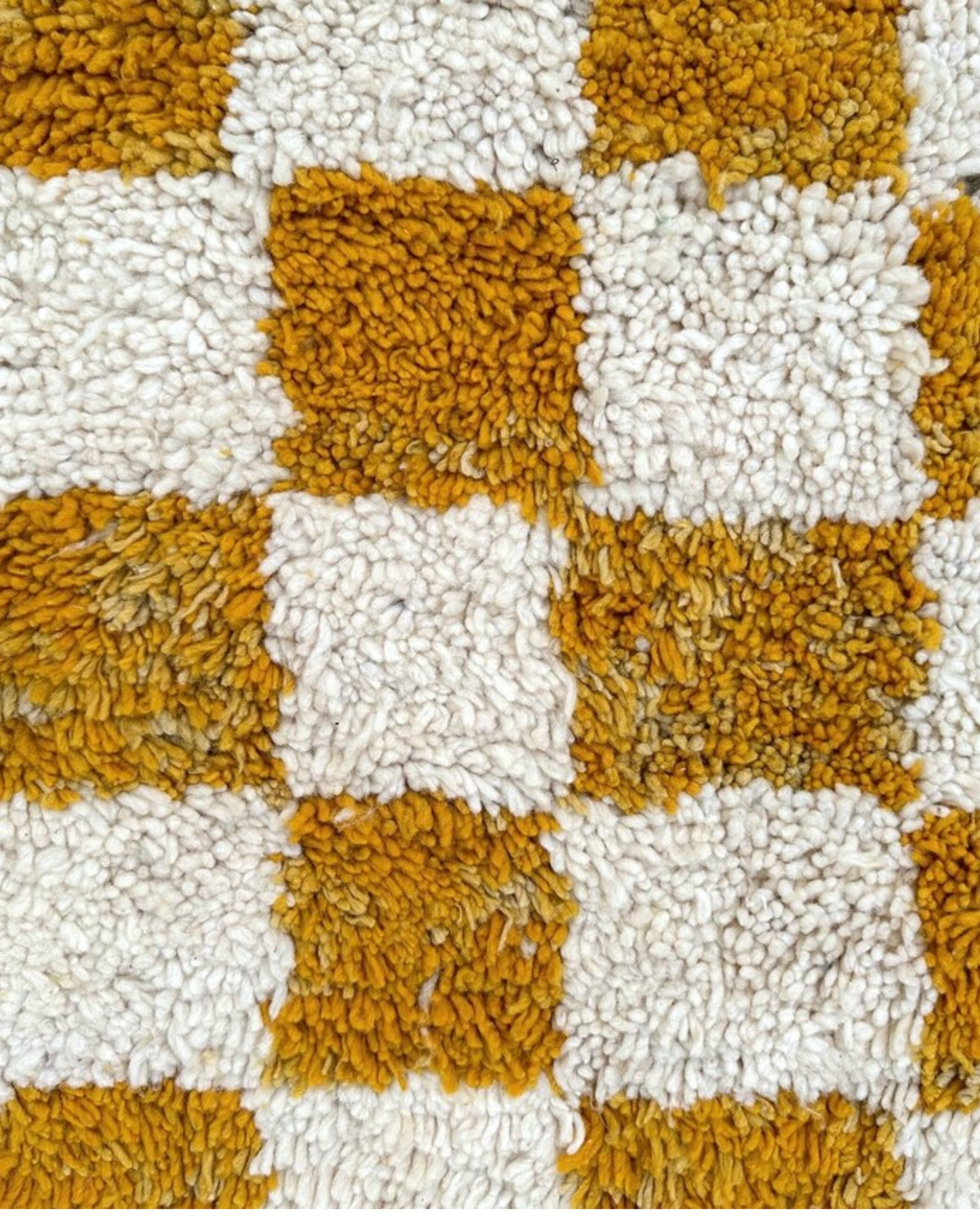 MAHA Beni Ourain mustard checker grid Moroccan rug close-up showing hand-knotted wool texture and pile detail, by NURA