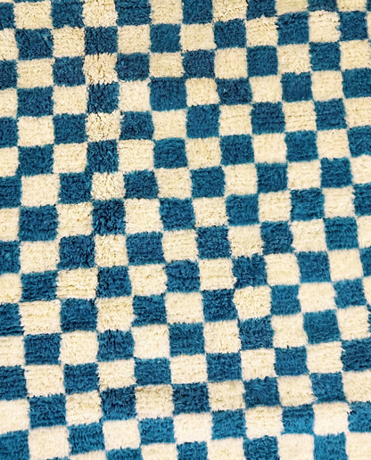 MAJDA Beni Ourain blue checker grid Moroccan rug close-up showing hand-knotted wool texture and pile detail 1, by NURA