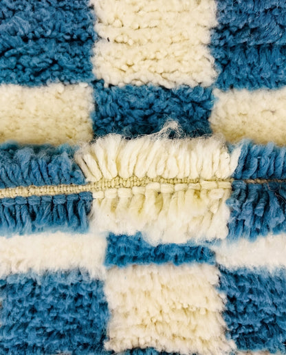 MAJDA Beni Ourain blue checker grid Moroccan rug close-up showing hand-knotted wool texture and pile detail 3, by NURA