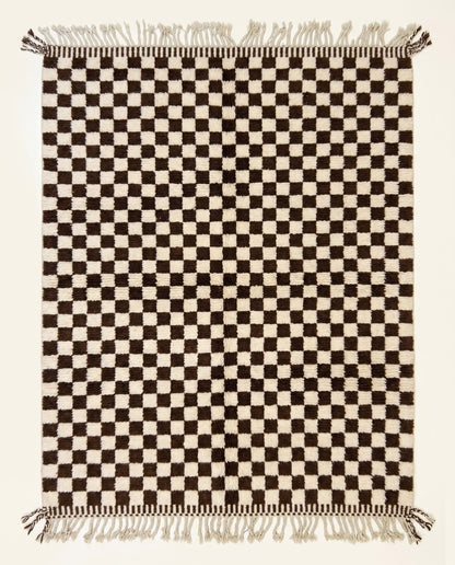 High pile Beni Ourain Moroccan rug by NURA featuring a bold chocolate brown and cream checkerboard pattern in plush wool.
