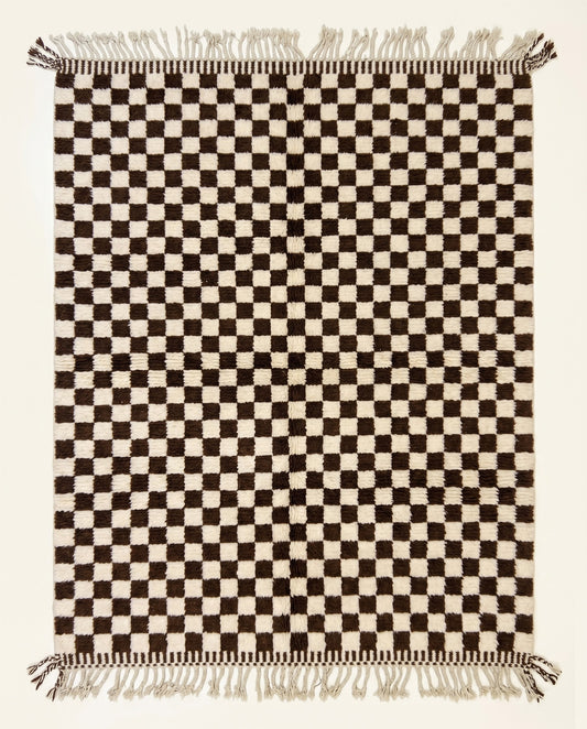 High pile Beni Ourain Moroccan rug by NURA featuring a bold chocolate brown and cream checkerboard pattern in plush wool.