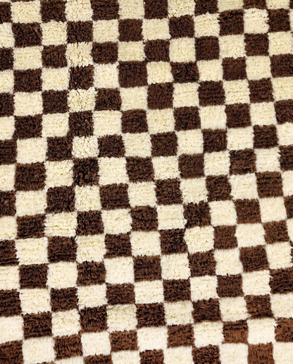 MAJIDA Beni Ourain chocolate checker grid Moroccan rug close-up showing hand-knotted wool texture and pile detail 1, by NURA