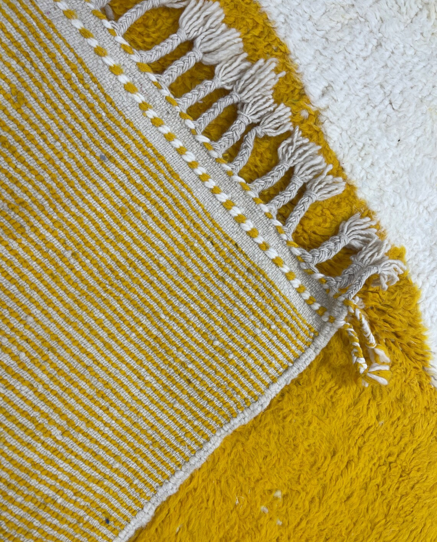 MARWA Beni Ourain mustard abstract color block Moroccan rug back view showing traditional handwoven construction, by NURA