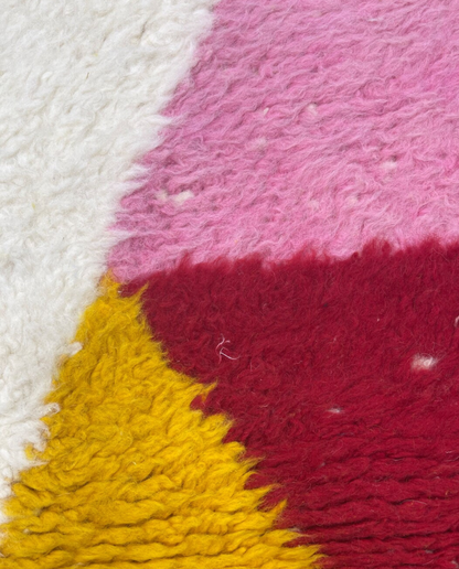 MARWA Beni Ourain mustard abstract color block Moroccan rug close-up showing hand-knotted wool texture and pile detail, by NURA