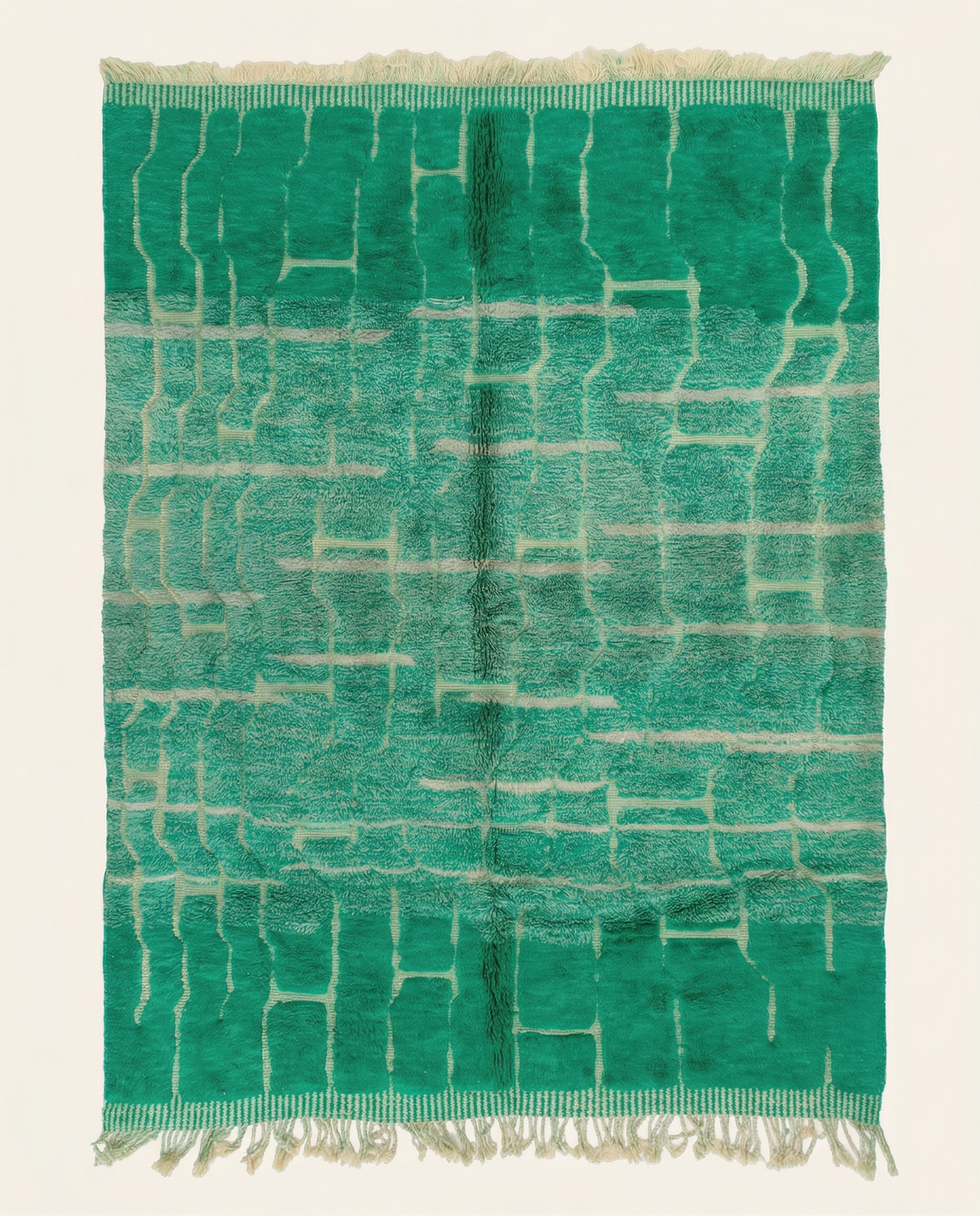 Plush emerald green Beni Ourain Moroccan rug with an irregular cream geometric grid and high pile, by NURA.