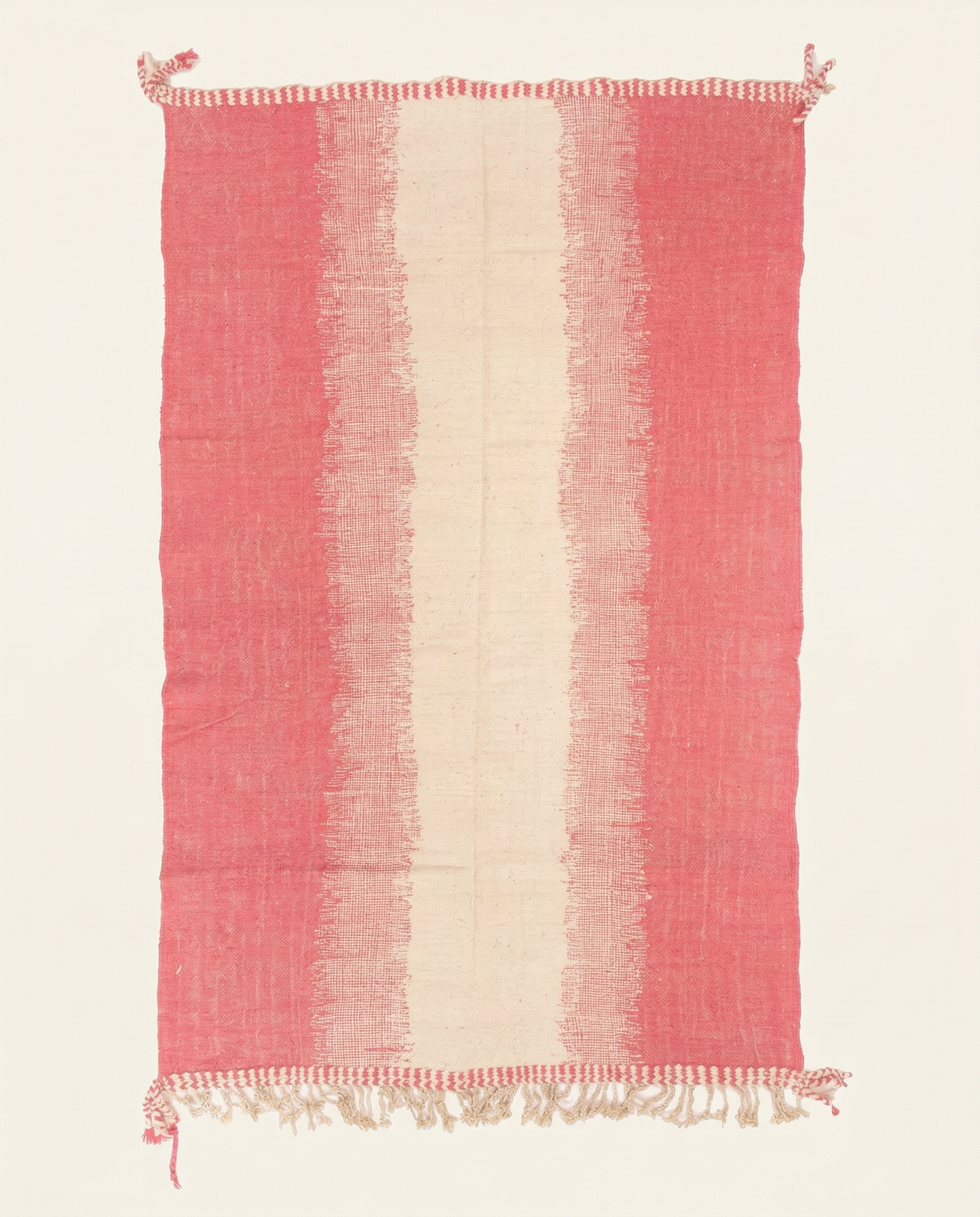 Vibrant hot pink and cream Boujad Moroccan flatweave rug with bold vertical stripes and braided fringes, by NURA.
